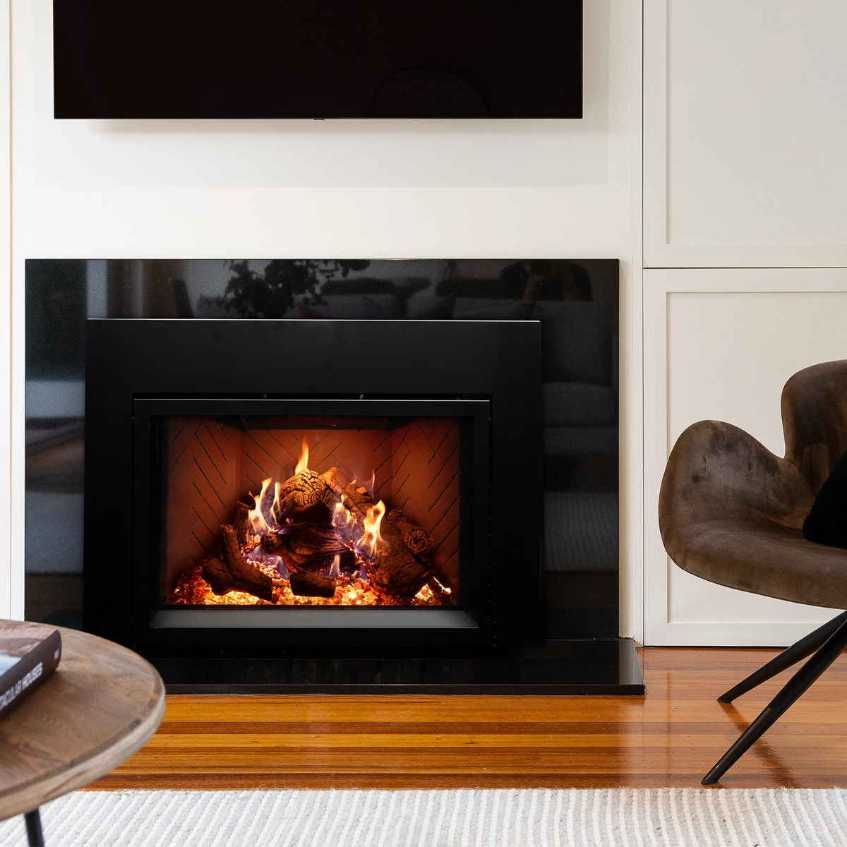 Empire Rainier gas fireplace insert installed, oak logs, red herringbone liner