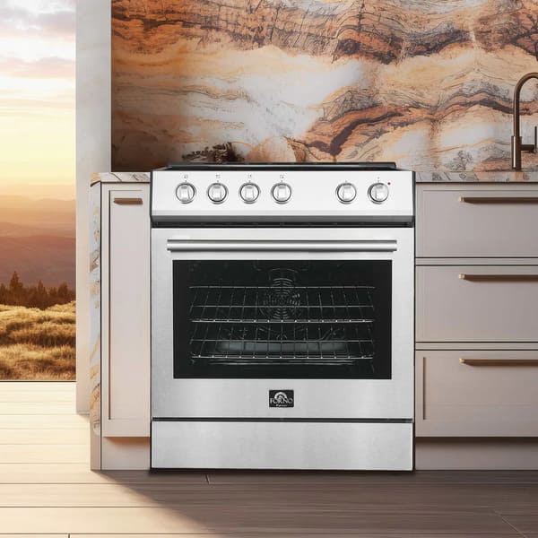 Lifestyle view of the Forno 30-inch electric range in stainless steel, featured in a modern kitchen setting with coordinated appliances and sleek cabinetry, highlighting its smooth cooktop, large oven window, and professional-style design.