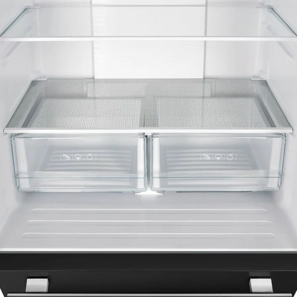 Close-up view of the crisper drawer inside the FORNO 30-inch French door refrigerator in black from the 2-Piece Appliance Package, featuring a transparent design with smooth gliding rails—ideal for keeping fruits and vegetables fresh and easily accessible.