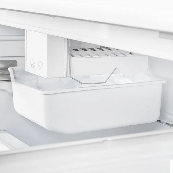 Close-up view of the built-in ice maker inside the FORNO 30-inch French door refrigerator in black from the 2-Piece Appliance Package, featuring a compact, integrated design with a clear ice bin for automatic and convenient ice production.