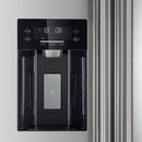 Close-up view of the built-in ice maker inside the Forno 36-inch side-by-side refrigerator with water dispenser, showing the compact ice bin and dispenser mechanism integrated into the freezer compartment for convenient ice access.