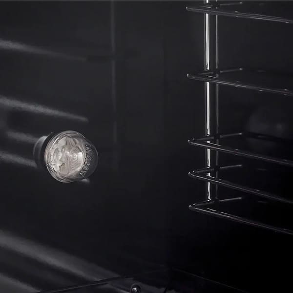 Close-up of the interior oven light in the FORNO 30-inch gas range, illuminating the oven cavity for enhanced visibility during cooking.