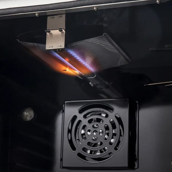 Interior view of the oven in the FORNO 30-inch gas range, showcasing a spacious cooking cavity, multiple rack positions, and bright interior lighting for optimal visibility.