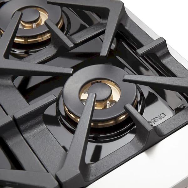 Close-up view of a sealed burner on the FORNO 48-inch Capriasca gas range from the 3-Piece Appliance Package, featuring a heavy-duty cast iron grate, precision flame ring, and stainless steel cooktop surface—designed for powerful, even heat distribution and high-performance cooking.