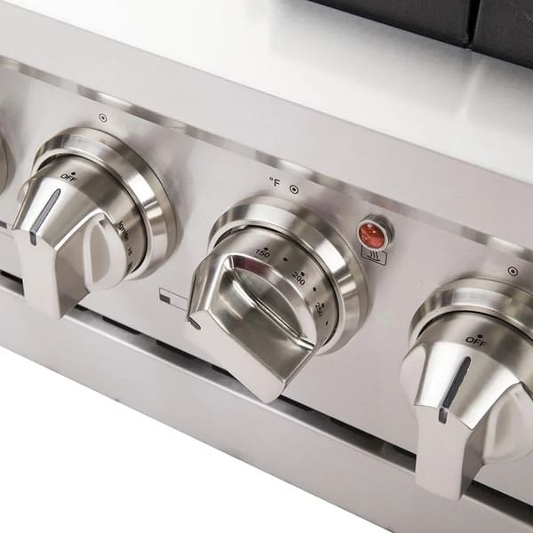Detailed close-up of the control knobs on the FORNO 48-inch Capriasca gas range from the 3-Piece Appliance Package, highlighting the metallic finish, knurled grip, and engraved burner and oven indicators for precise, professional-style operation.