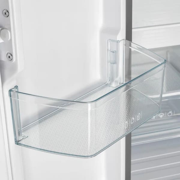 Close-up of a door bin inside the FORNO 30-Inch French Door Refrigerator in Black, showcasing a clear storage compartment designed for easy access to beverages, condiments, and small items.
