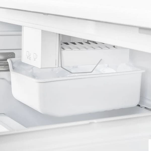 Close-up view of the built-in ice maker inside the FORNO 30-Inch French Door Refrigerator in Black, featuring a compact design and integrated ice storage bin for convenient access.
