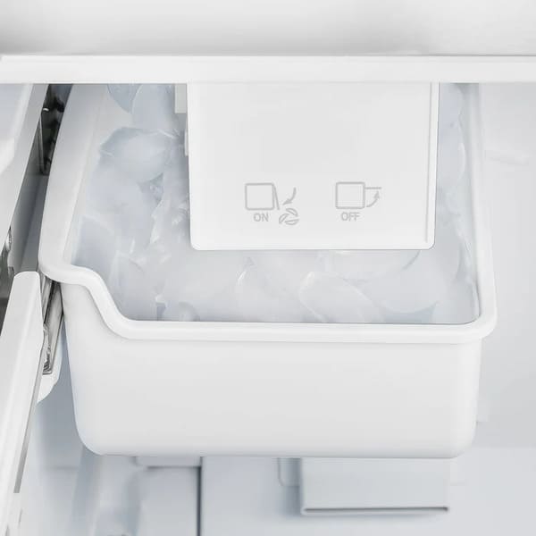 Close-up view of the built-in ice maker inside the FORNO 30-Inch French Door Refrigerator in White, showing the compact design and ice storage compartment for convenient access.