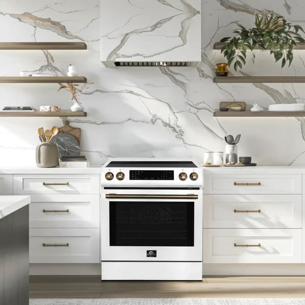 Lifestyle image of the FORNO 30-Inch Induction Range in White, installed in a modern kitchen setting with coordinating cabinetry and décor, showcasing its sleek design and professional appearance.