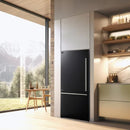 Lifestyle image of the FORNO 31-Inch Bottom Freezer Door Refrigerator in Black, seamlessly integrated into a contemporary kitchen, highlighting its sleek black finish and modern, space-efficient design.