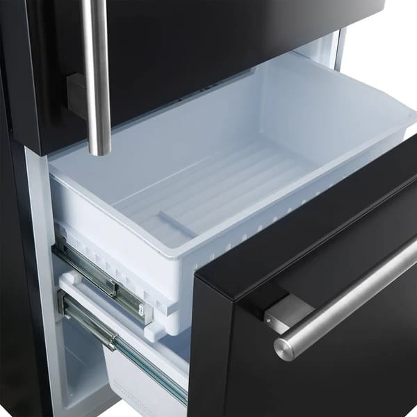 Open view of the freezer drawer in the FORNO 31-Inch Refrigerator with Right Hinge in Black, showing spacious compartments for organized frozen food storage.