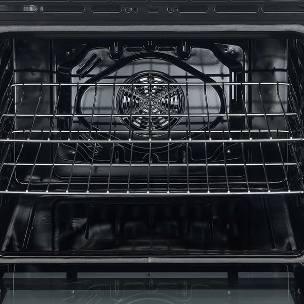 Interior view of the FORNO 30-inch electric range in stainless steel, displaying spacious oven cavity with multiple rack positions and convection fan.
