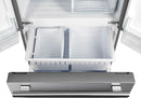 Open view of the bottom freezer drawer in the FORNO 30-inch French door refrigerator in stainless steel, revealing spacious freezer compartments for organized frozen food storage.