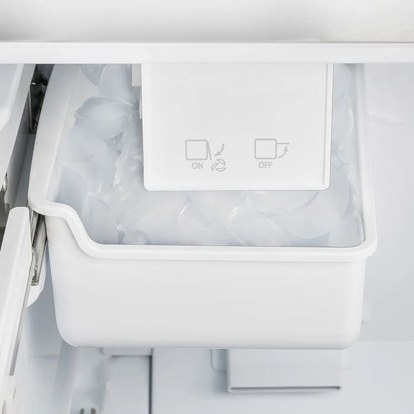 Close-up of the built-in ice maker inside the FORNO 30-inch French door refrigerator in stainless steel, highlighting the compact design and efficient ice storage compartment.