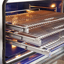 Open oven view of FORNO Capriasca 36" Gas Range featuring spacious blue enamel interior, convection fan, and 3 heavy-duty sliding racks.

