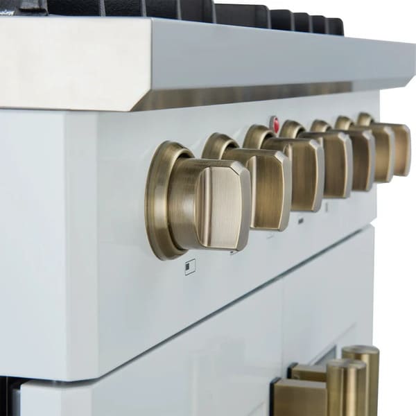Close-up view of the FORNO Galiano 30-Inch Dual Fuel Range in white, showcasing antique brass control knobs with bezel rings and clear burner indicator markings.
