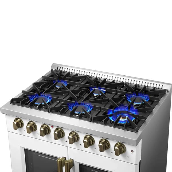 Right-angle view of the cooktop on the FORNO Galiano 36-Inch French Door Dual Fuel Range in white, showcasing six sealed gas burners, antique brass knobs, and durable cast iron grates for a premium cooking surface.