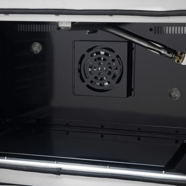 Interior view of the FORNO Galiano 36-Inch French Door Gas Range in black, highlighting the convection fan within the blue porcelain oven cavity, designed for even heat distribution and multi-rack cooking.