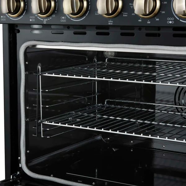 Angled interior view of the FORNO Paolo 36-Inch Electric Range in black, showcasing the spacious blue enamel oven cavity, convection fan, and durable multi-level oven racks.