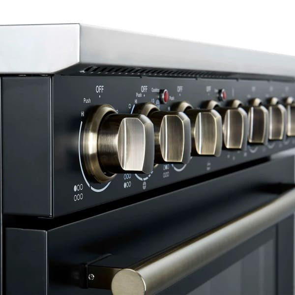Close-up of the control knobs on the FORNO Paolo 36-Inch Electric Range in black, featuring stainless steel dials with precision markings set against a sleek black panel.