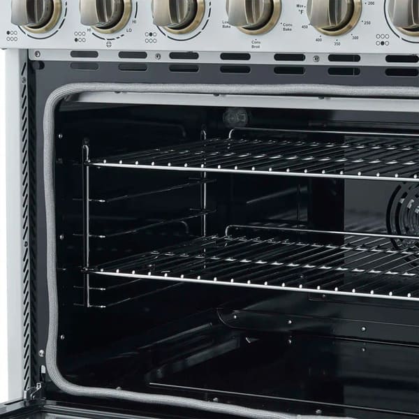 Angled close-up of the FORNO Paolo 36-Inch Electric Range in white, showing the spacious blue enamel oven interior with convection fan and heavy-duty racks for even, multi-level cooking.