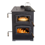 Buck Stove Homesteader wood cook stove with oven door open and cooktop