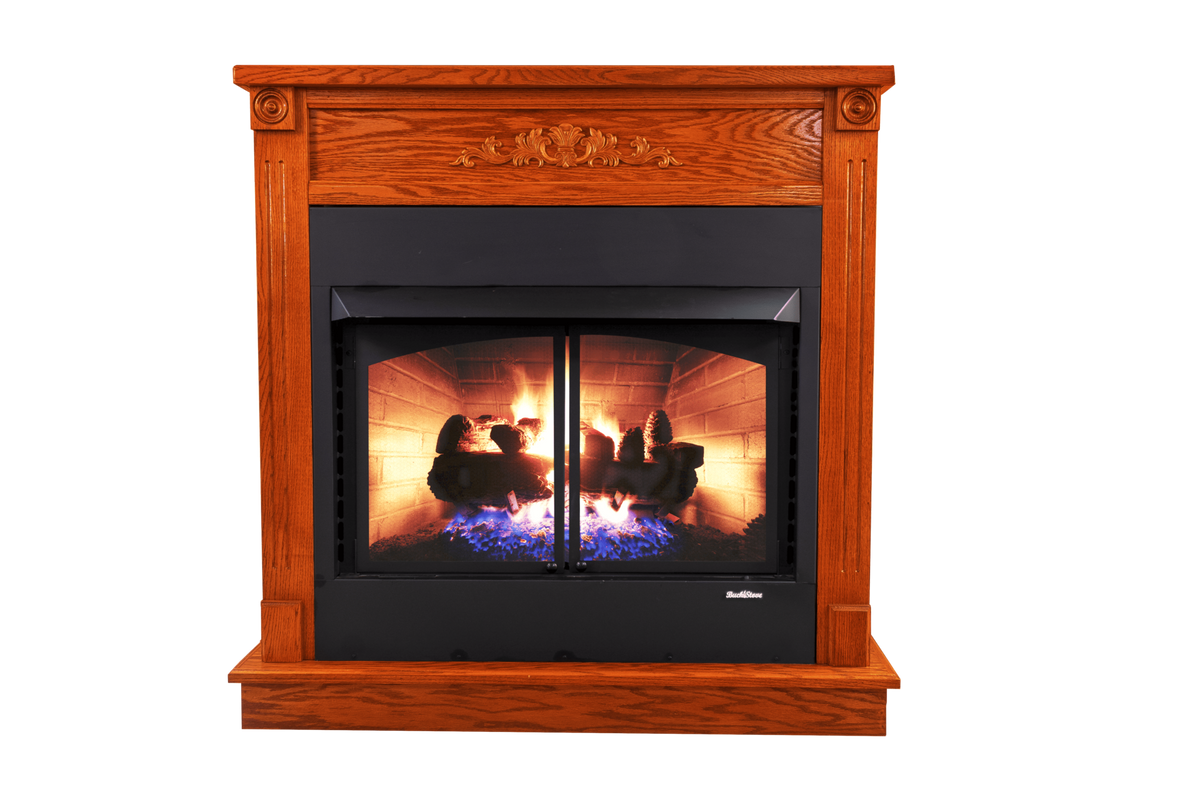 Buck Stove ZCBB XL builder series gas firebox in an oak mantel, lit