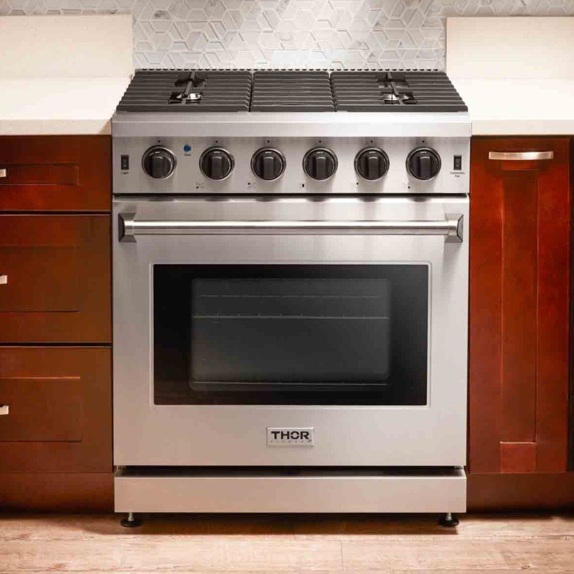Thor Kitchen 4-Piece Appliance Package - 30-Inch Gas Range, French Door Refrigerator, Wall Mount Hood, and Dishwasher in Stainless Steel