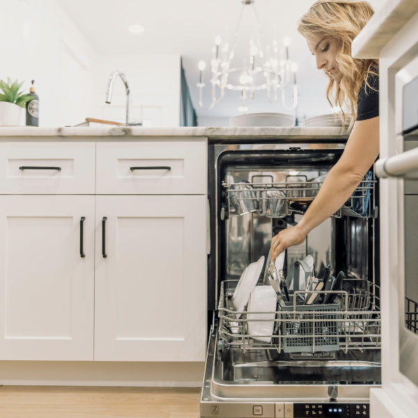 The ZLINE Dishwasher being used by the person